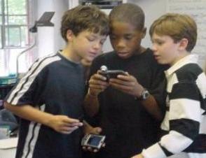 picture of students using a handheld